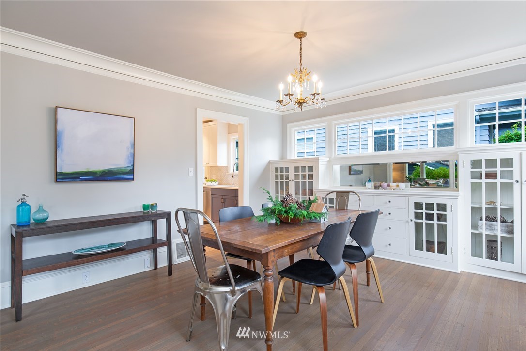 3135 37th Place South Seattle, WA 98144 - Photo 5 of 31 a view of a dining room with furniture window and wooden floor