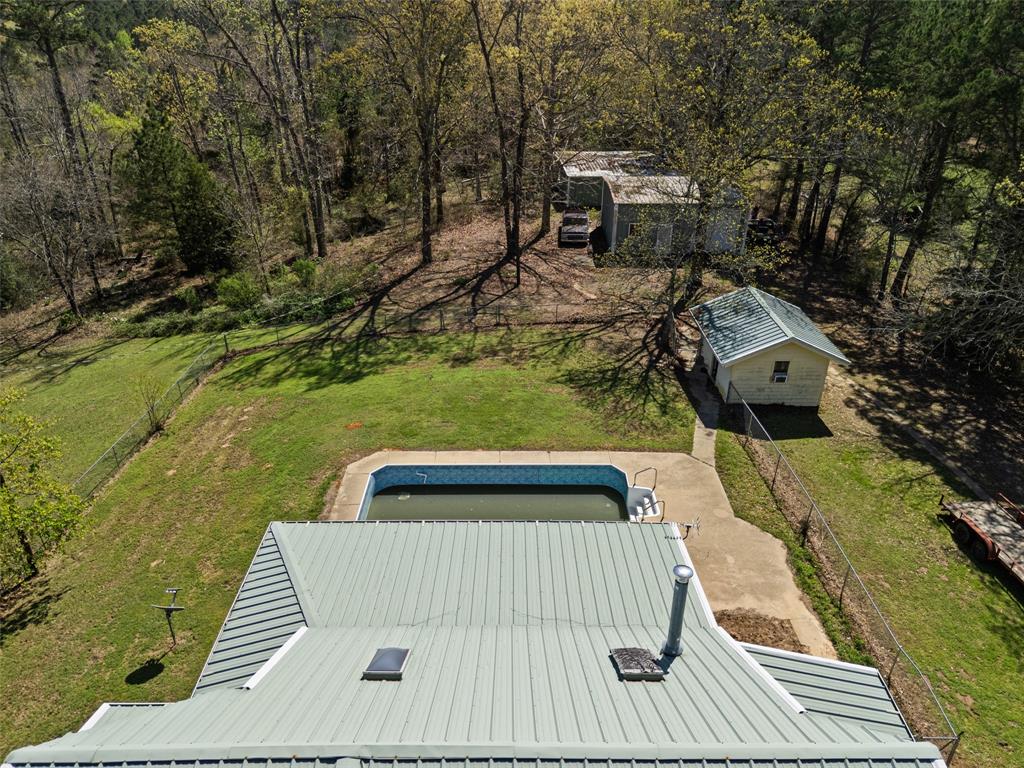 533 Huffman Road Harleton, TX 75651 - Photo 12 of 40 a view of a patio with chairs