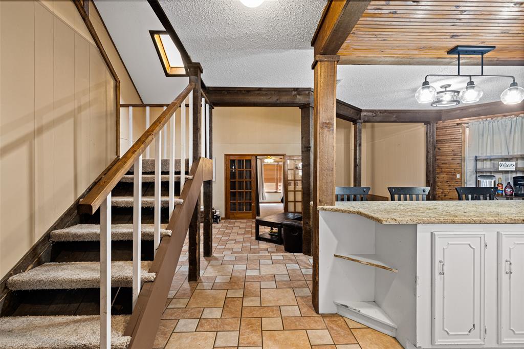 533 Huffman Road Harleton, TX 75651 - Photo 16 of 40 a view of entryway and hall with wooden floor