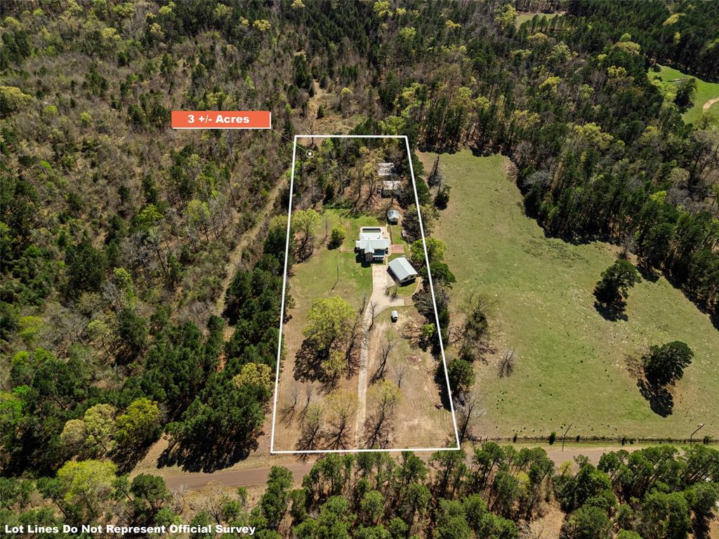 533 Huffman Road Harleton, TX 75651 - Photo 3 of 40 a view of a yard