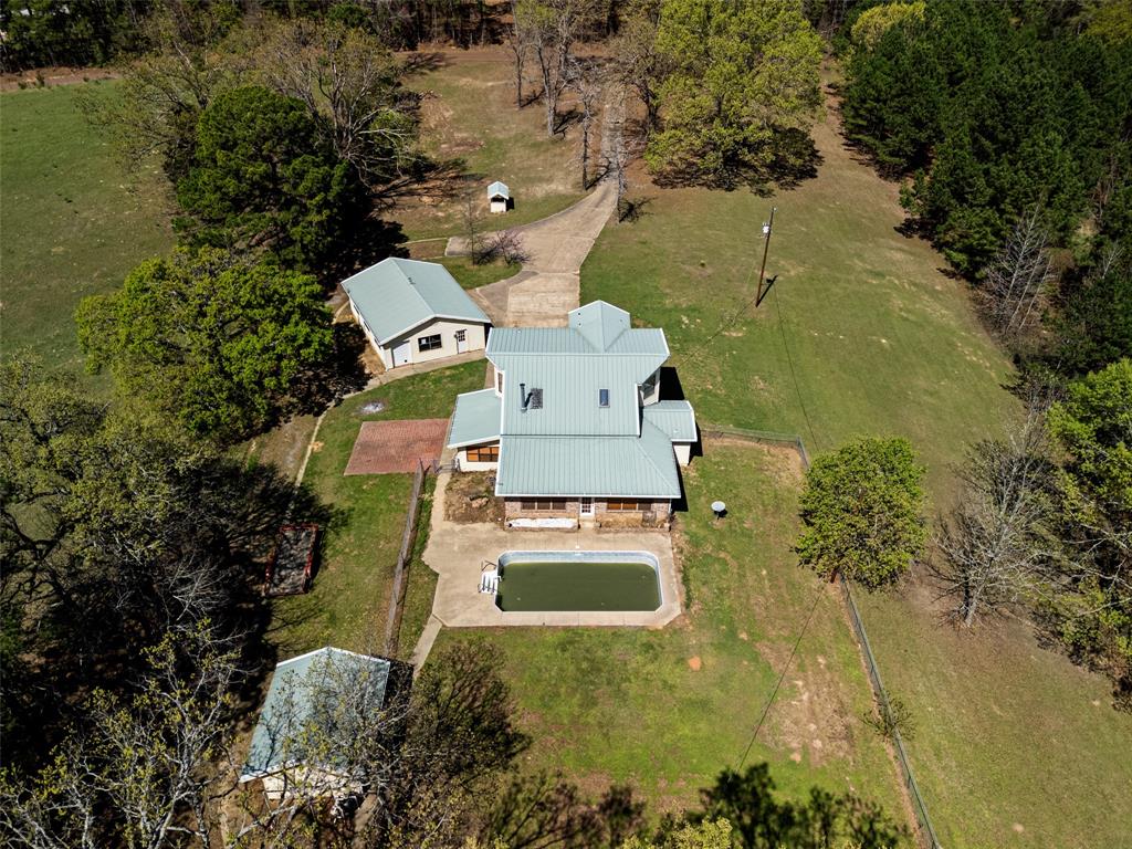 533 Huffman Road Harleton, TX 75651 - Photo 6 of 40 an aerial view of residential houses with outdoor space