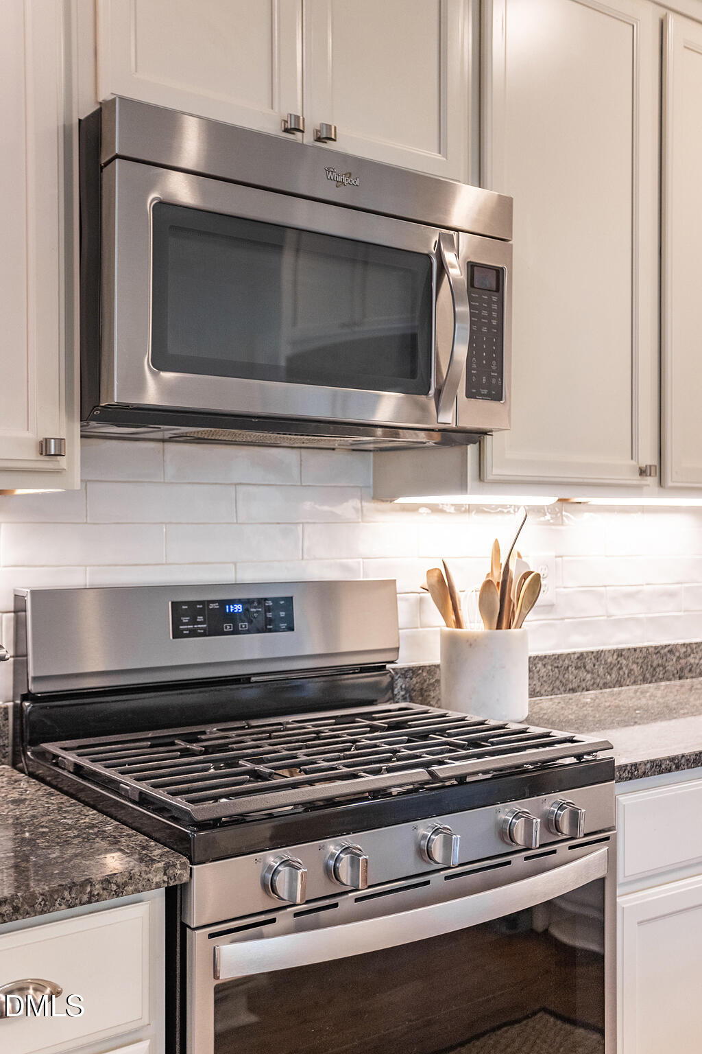 2203 Chapel Hill Road Durham, NC 27707 - Photo 13 of 30 a stove top oven sitting inside of a kitchen