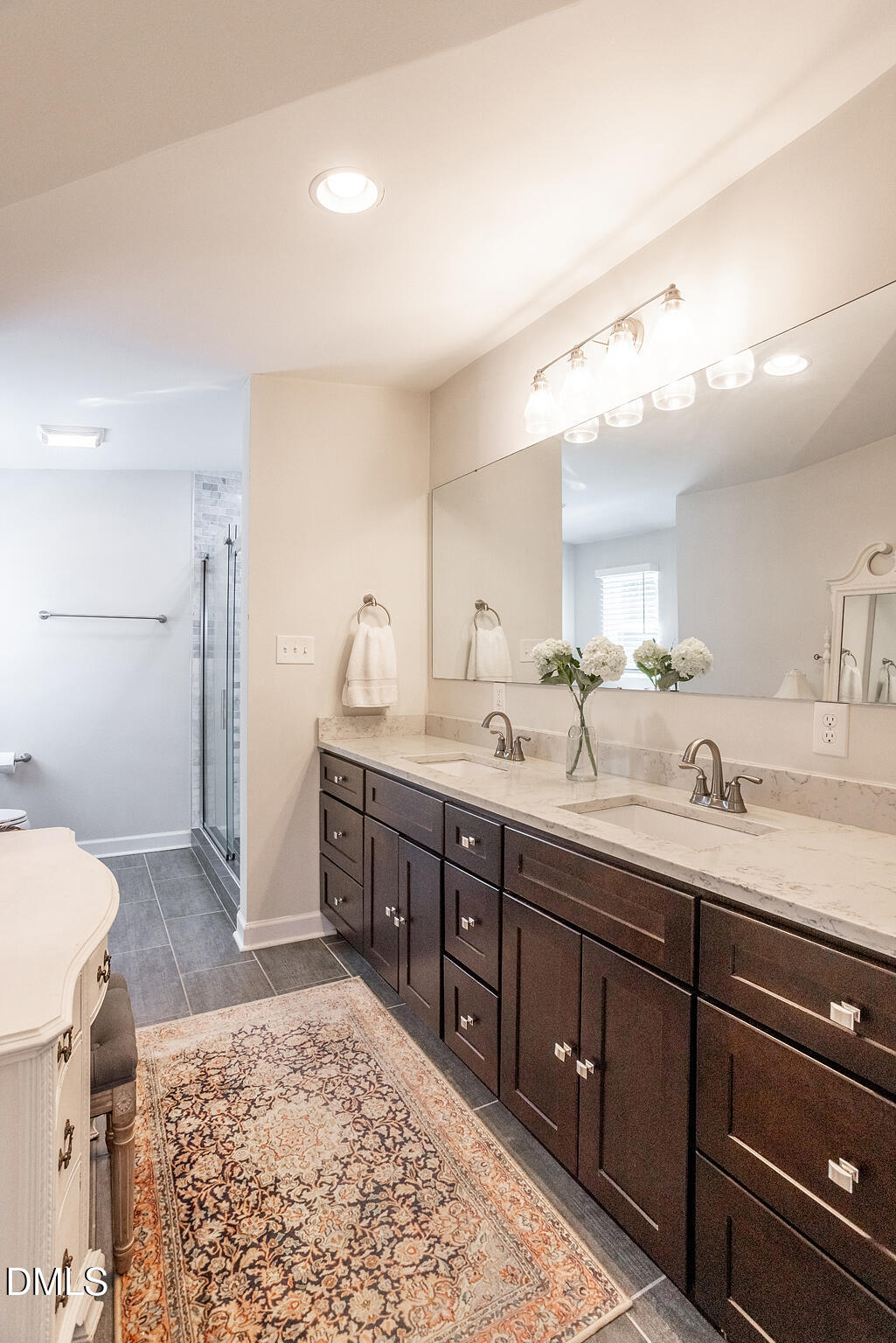 2203 Chapel Hill Road Durham, NC 27707 - Photo 16 of 30 a bathroom with a sink and a mirror