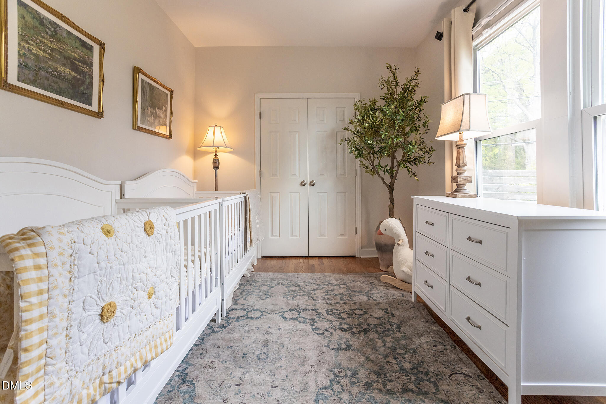 2203 Chapel Hill Road Durham, NC 27707 - Photo 21 of 30 a view of a bedroom with baby crib and a window