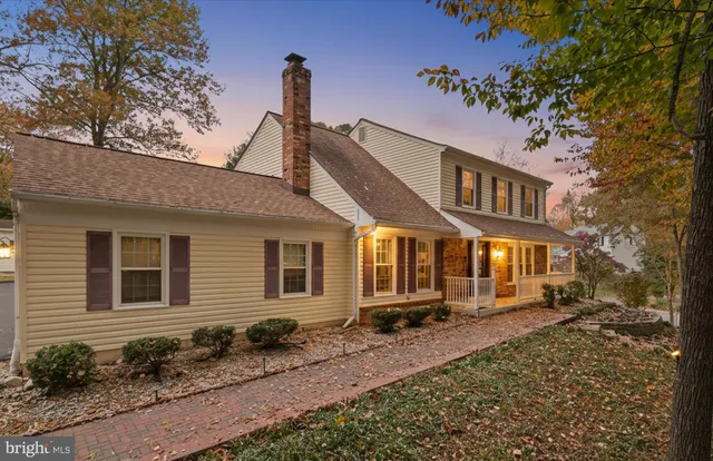 a front view of a house with yard