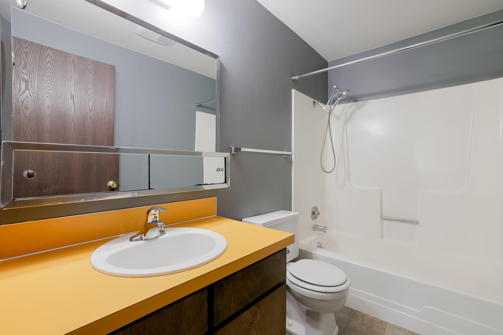 19968 Double Tree Court Bend, OR 97702 - Photo 15 of 28 a bathroom with a sink toilet and shower