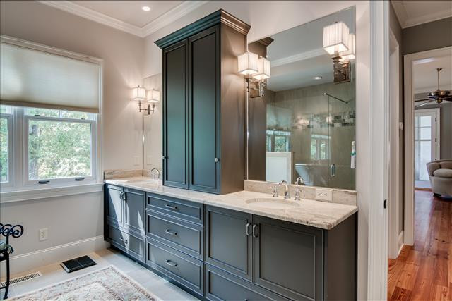 188 Squirrel Road Salley, SC 29137 - Photo 17 of 31 a bathroom with a double vanity sink and a mirror