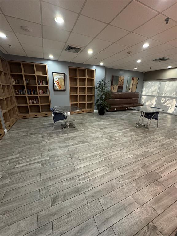 850 North Miami Avenue, Unit W703 Miami, FL 33136 - Photo 25 of 38 a view of an empty room with wooden floor and a window