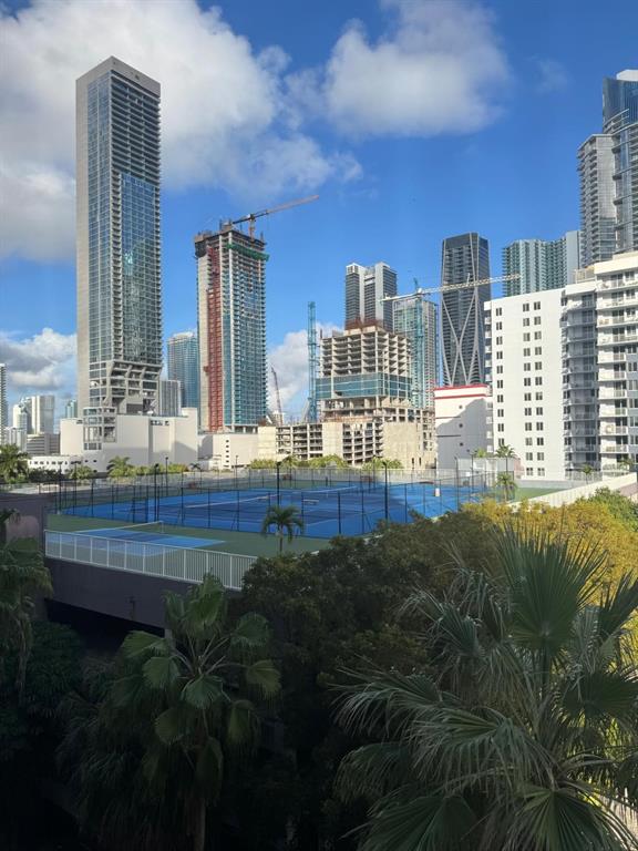 850 North Miami Avenue, Unit W703 Miami, FL 33136 - Photo 29 of 38 a view of a city with tall buildings and a big yard