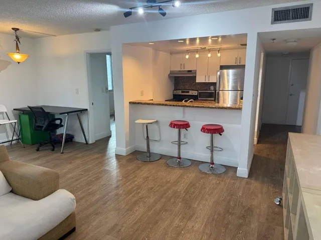 a room with table and chairs