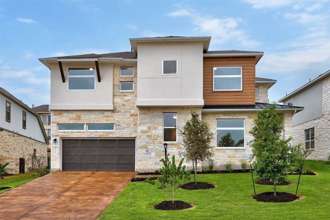 a front view of house with yard