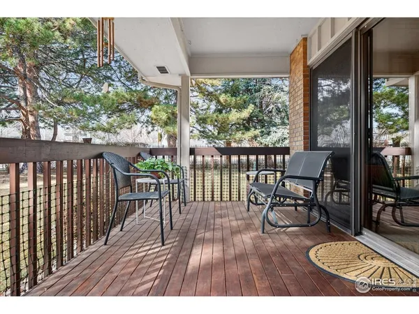 a view of a chairs on the roof deck