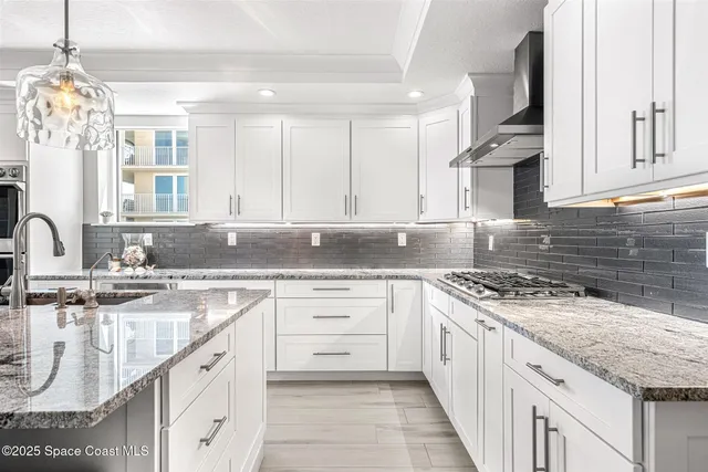 a view of a dining room with furniture and window