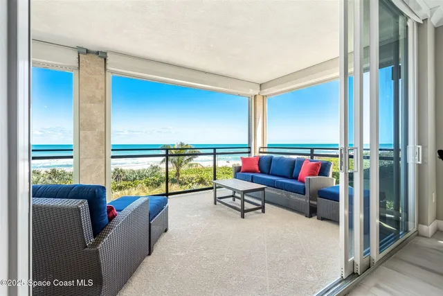 a view of an ocean from a balcony