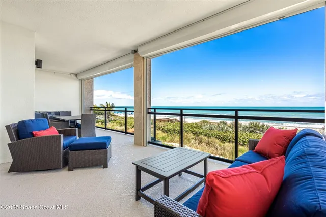 a view of an ocean from a balcony