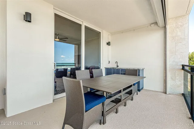 a bedroom with furniture and a wooden floor