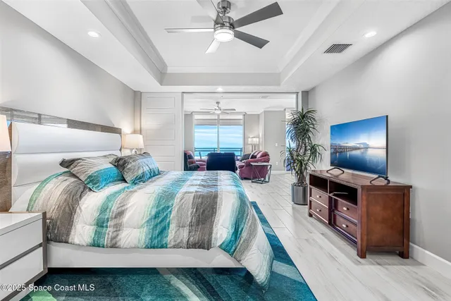 a spacious bathroom with a granite countertop sink and a mirror