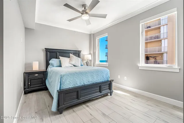 a view of parking garage with cars parked