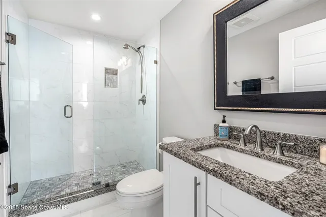 a view of swimming pool with outdoor seating