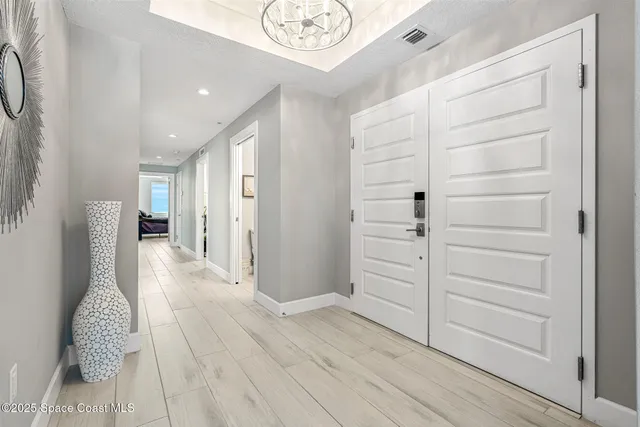 a kitchen with granite countertop a stove sink and cabinets