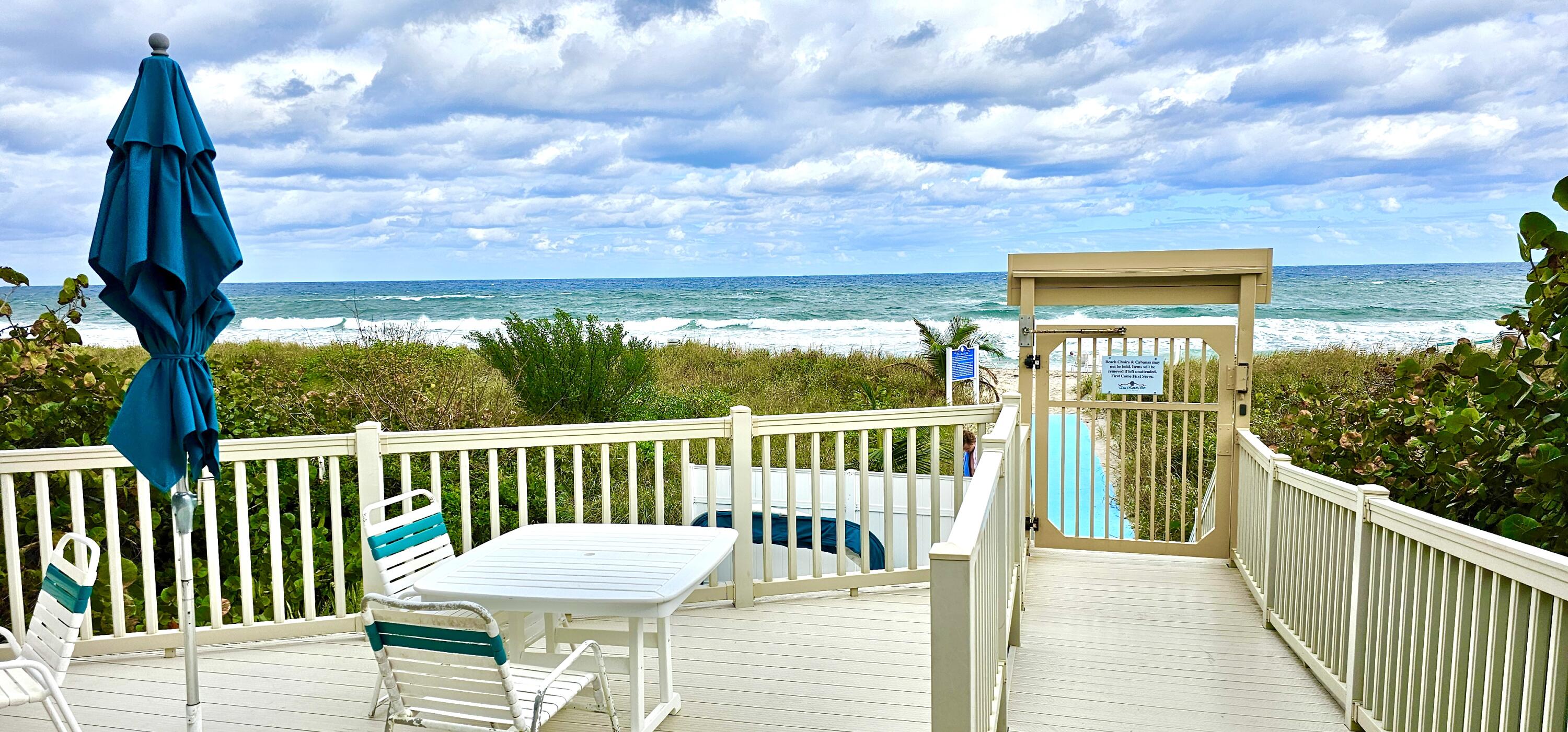 4101 North Ocean Boulevard, Unit 703 Boca Raton, FL 33431 - Photo 29 of 31 a view of a chair and table in the balcony