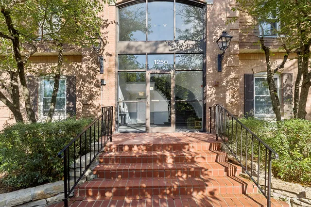 a view of a pathway with a yard