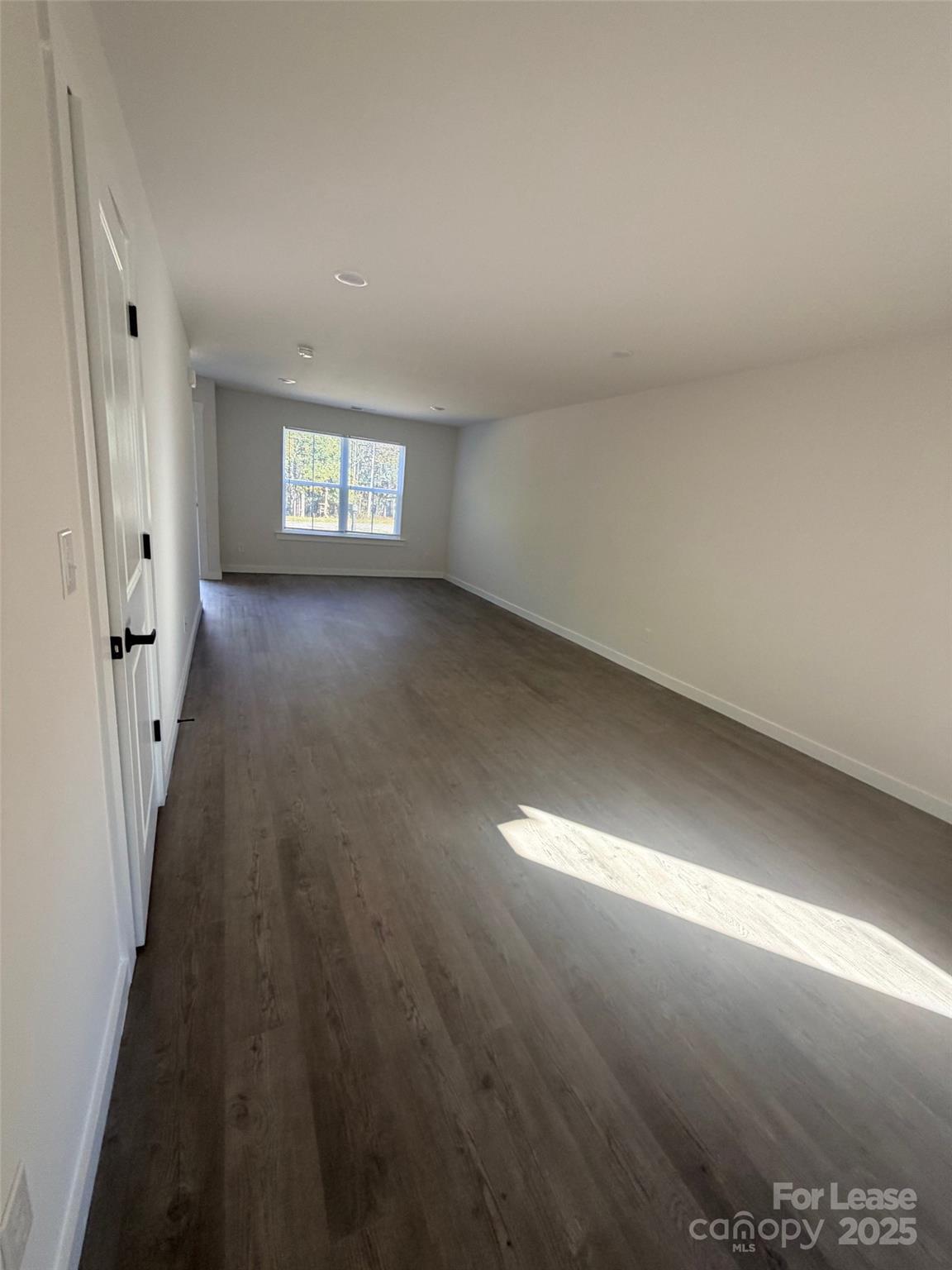 407 15th Avenue Southwest Hickory, NC 28602 - Photo 5 of 10 en empty room with windows