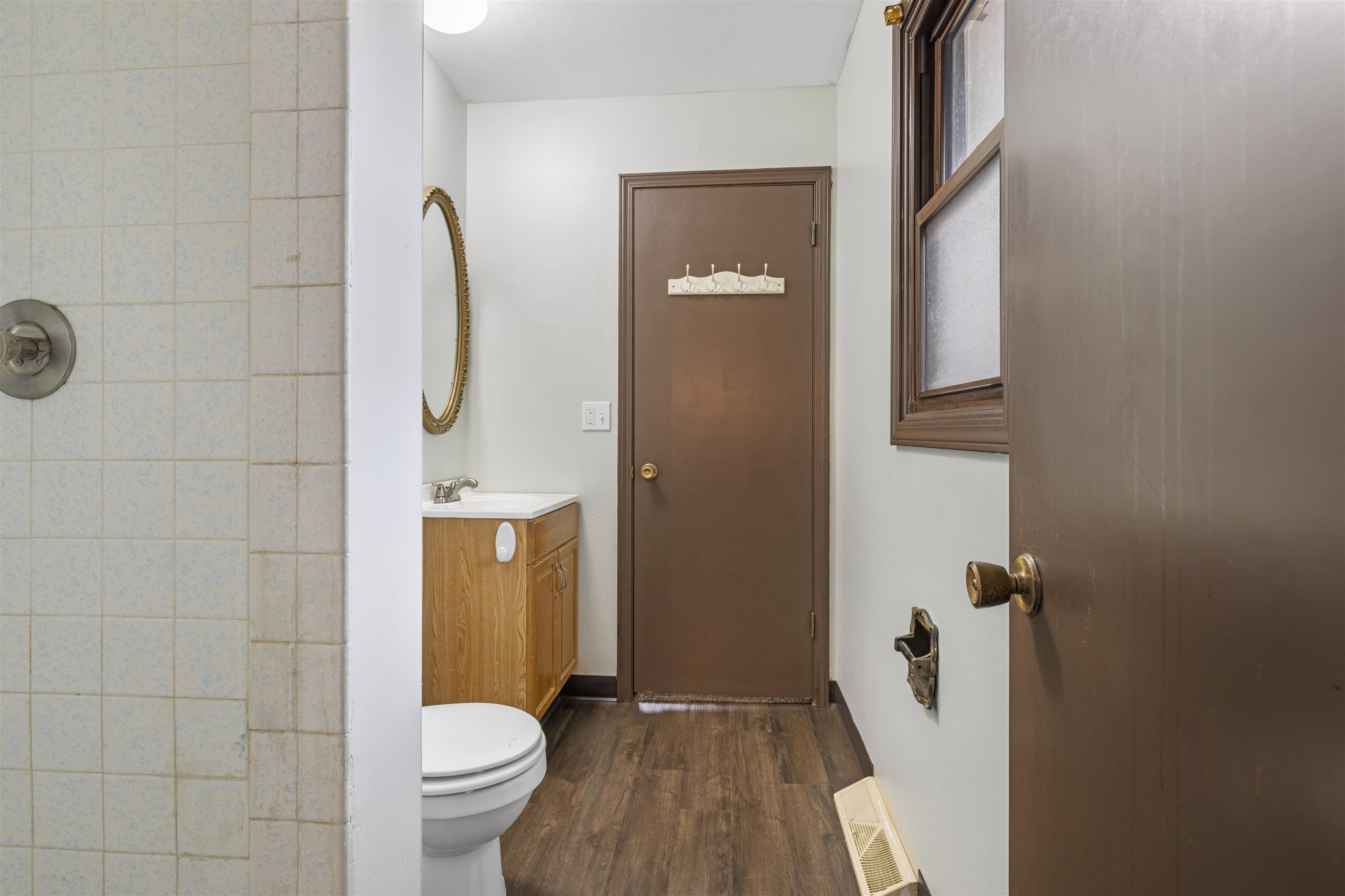 3428 Springwheat Street Rockford, IL 61114 - Photo 17 of 21 a bathroom with a sink and toilet