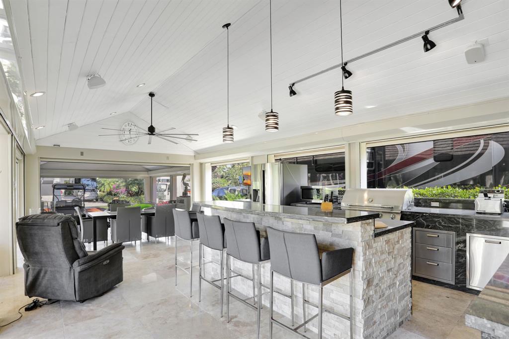 431 South Cortez Drive, Unit 431 Margate, FL 33068 - Photo 12 of 32 a kitchen with stainless steel appliances granite countertop a stove and a refrigerator