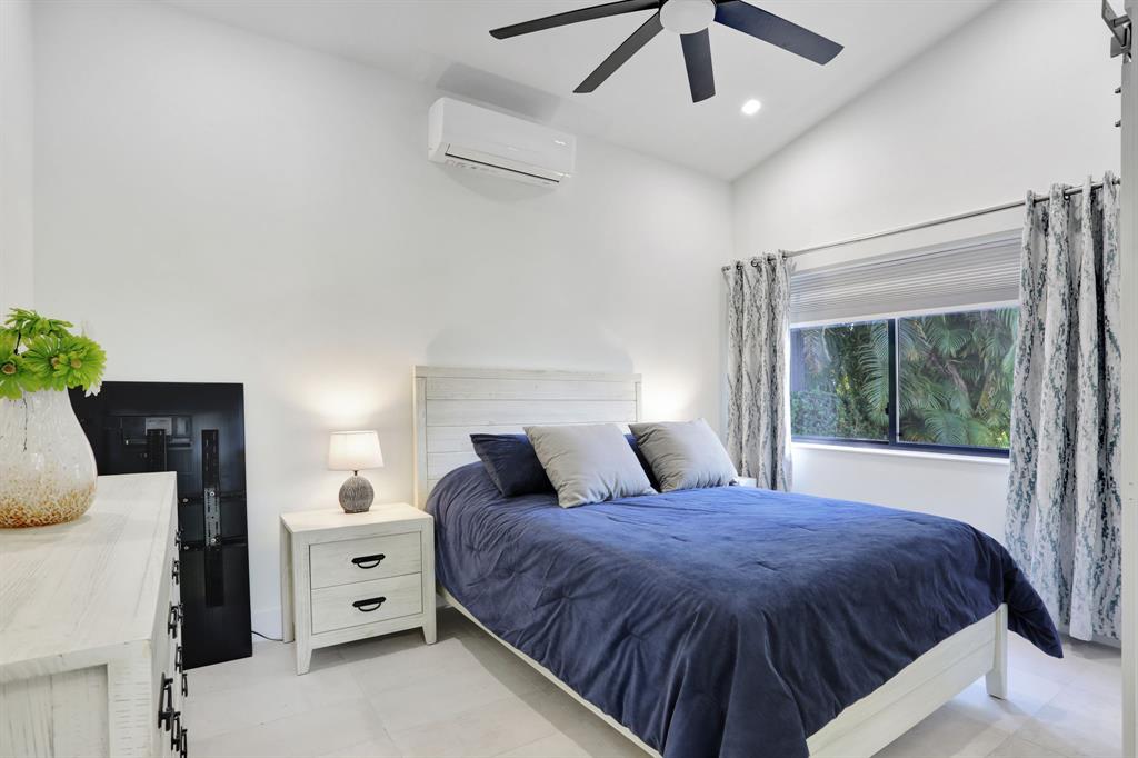 431 South Cortez Drive, Unit 431 Margate, FL 33068 - Photo 14 of 32 a spacious bedroom with a bed and a window
