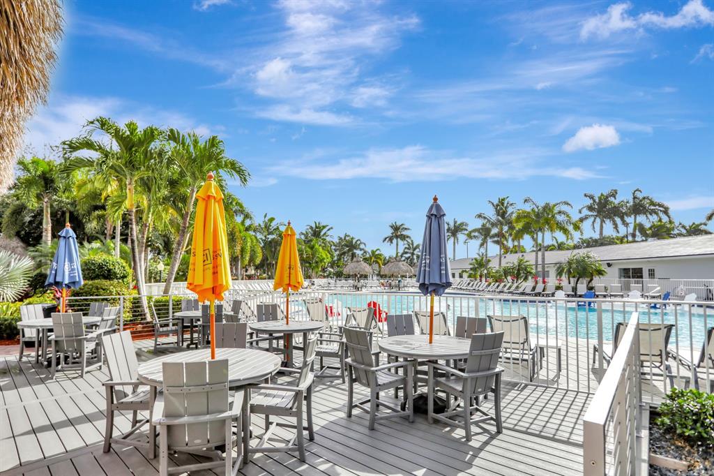 431 South Cortez Drive, Unit 431 Margate, FL 33068 - Photo 28 of 32 a view of a chairs and table in patio