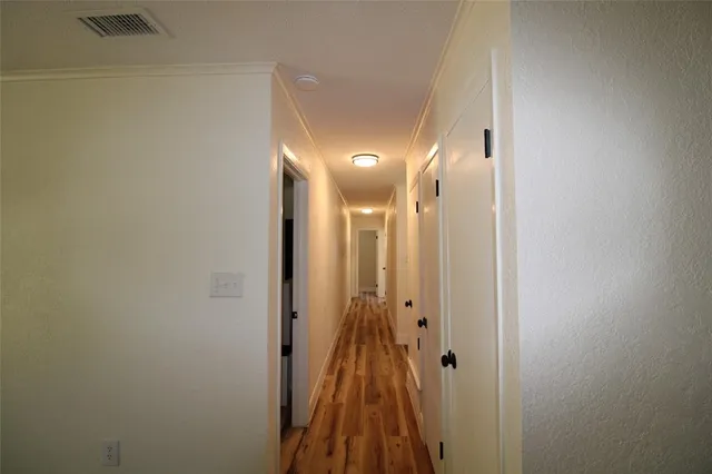 a view of a bathroom with a mirror