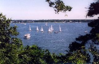a view of a lake with a building in the background