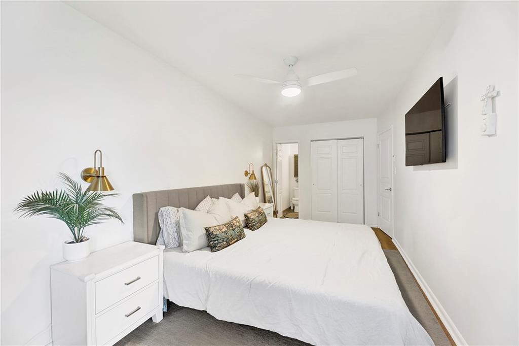 8940 Colonial Road, Unit 3 Brooklyn, NY 11209 - Photo 13 of 21 a bedroom with a bed and a flat screen tv