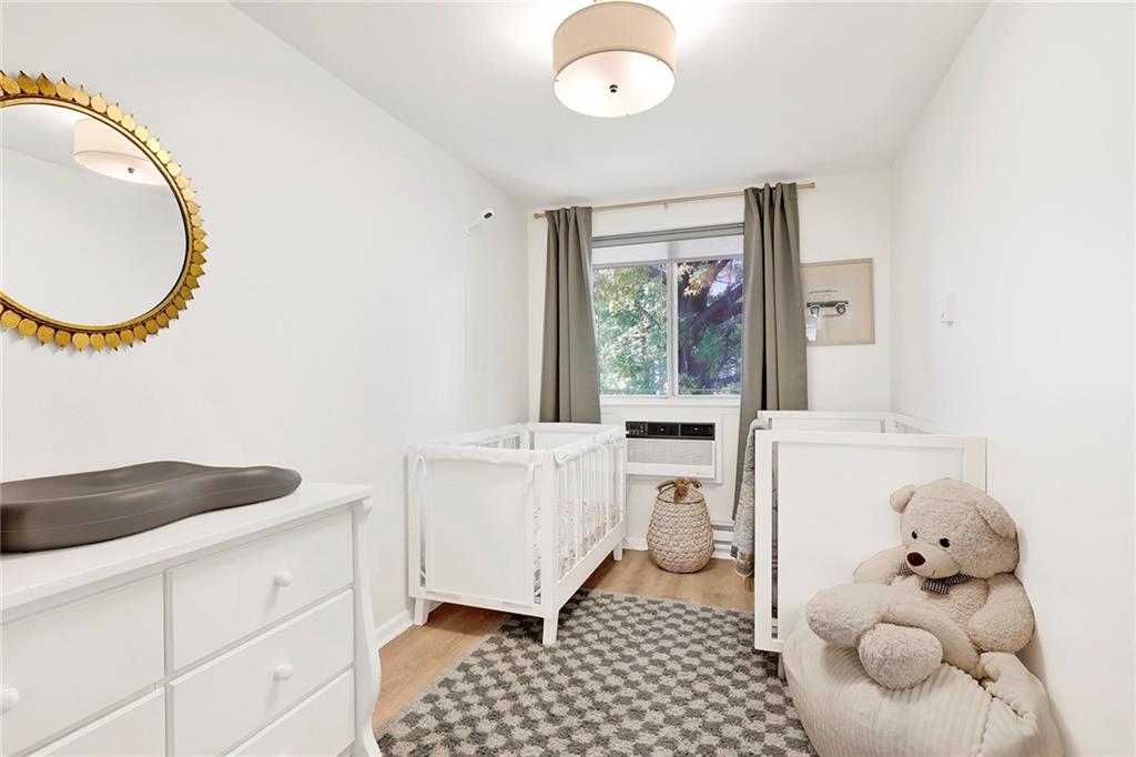8940 Colonial Road, Unit 3 Brooklyn, NY 11209 - Photo 15 of 21 a bathroom with a sink a mirror and a bathtub
