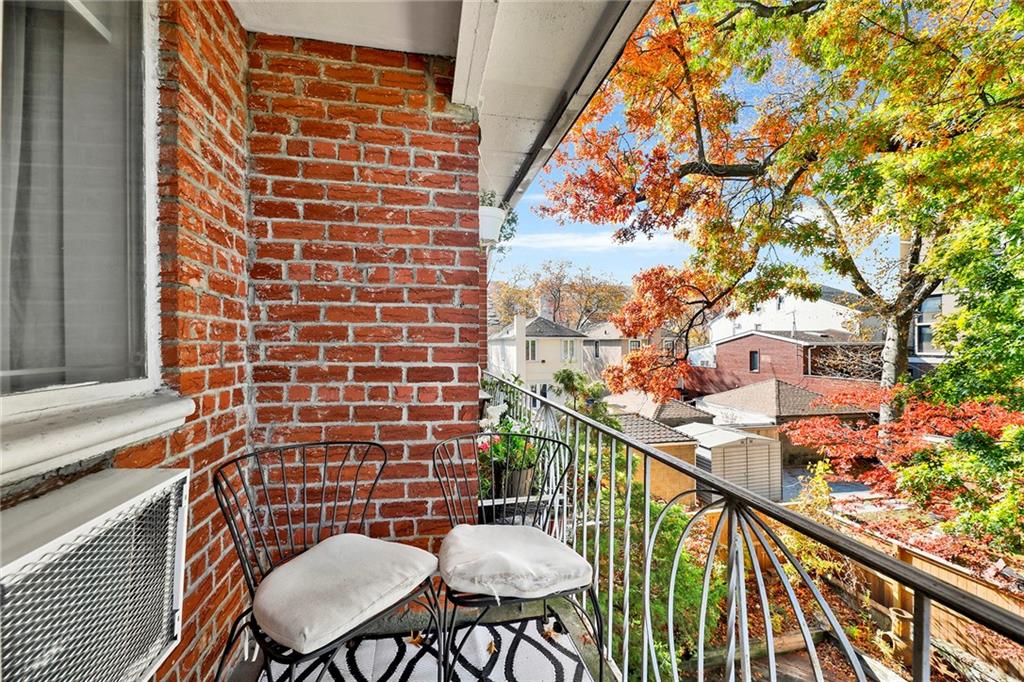 8940 Colonial Road, Unit 3 Brooklyn, NY 11209 - Photo 4 of 21 a balcony view with couple of chairs