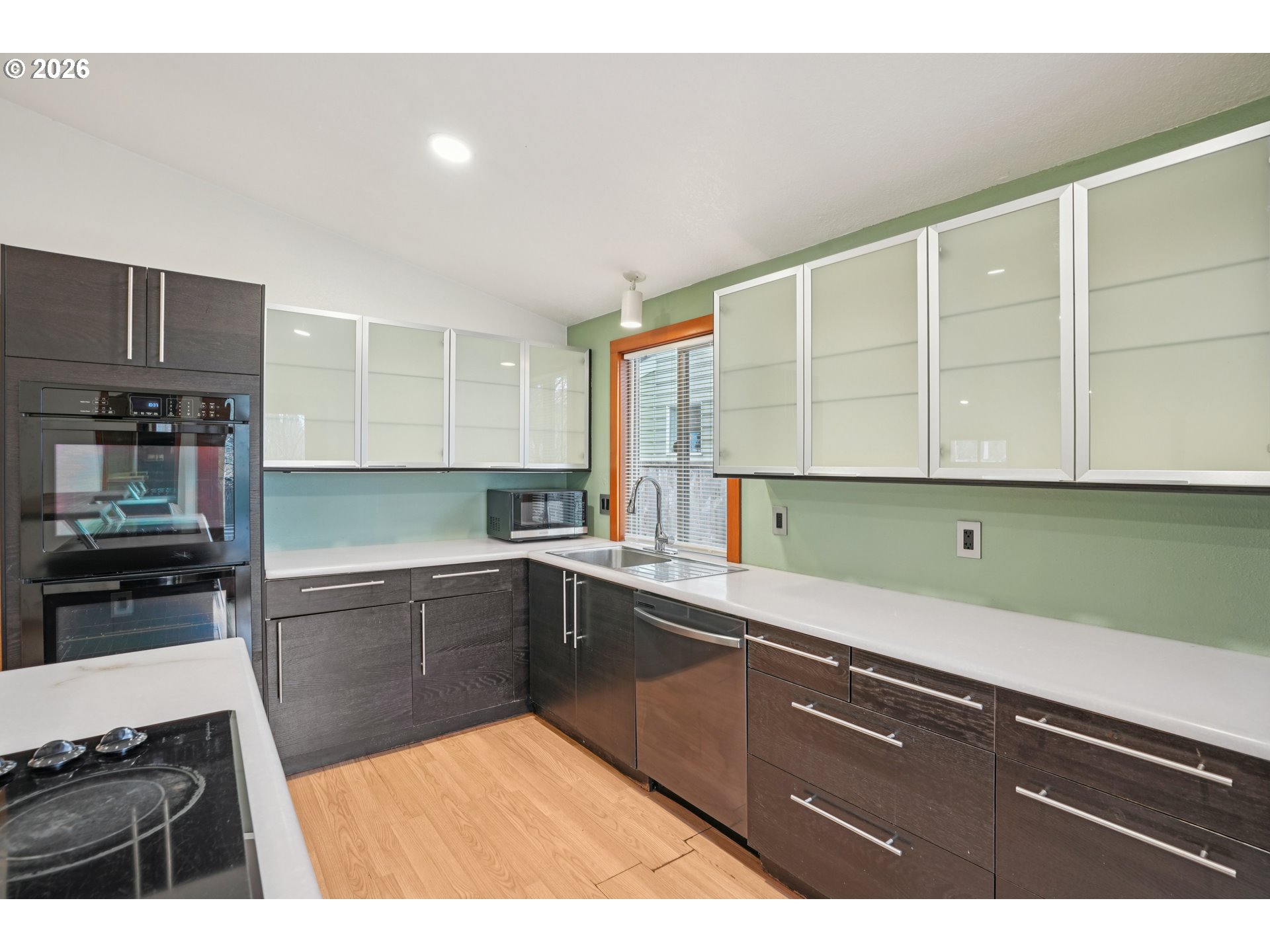 4133 Southeast Tibbetts Street Portland, OR 97202 - Photo 13 of 35 a kitchen with a sink and cabinets