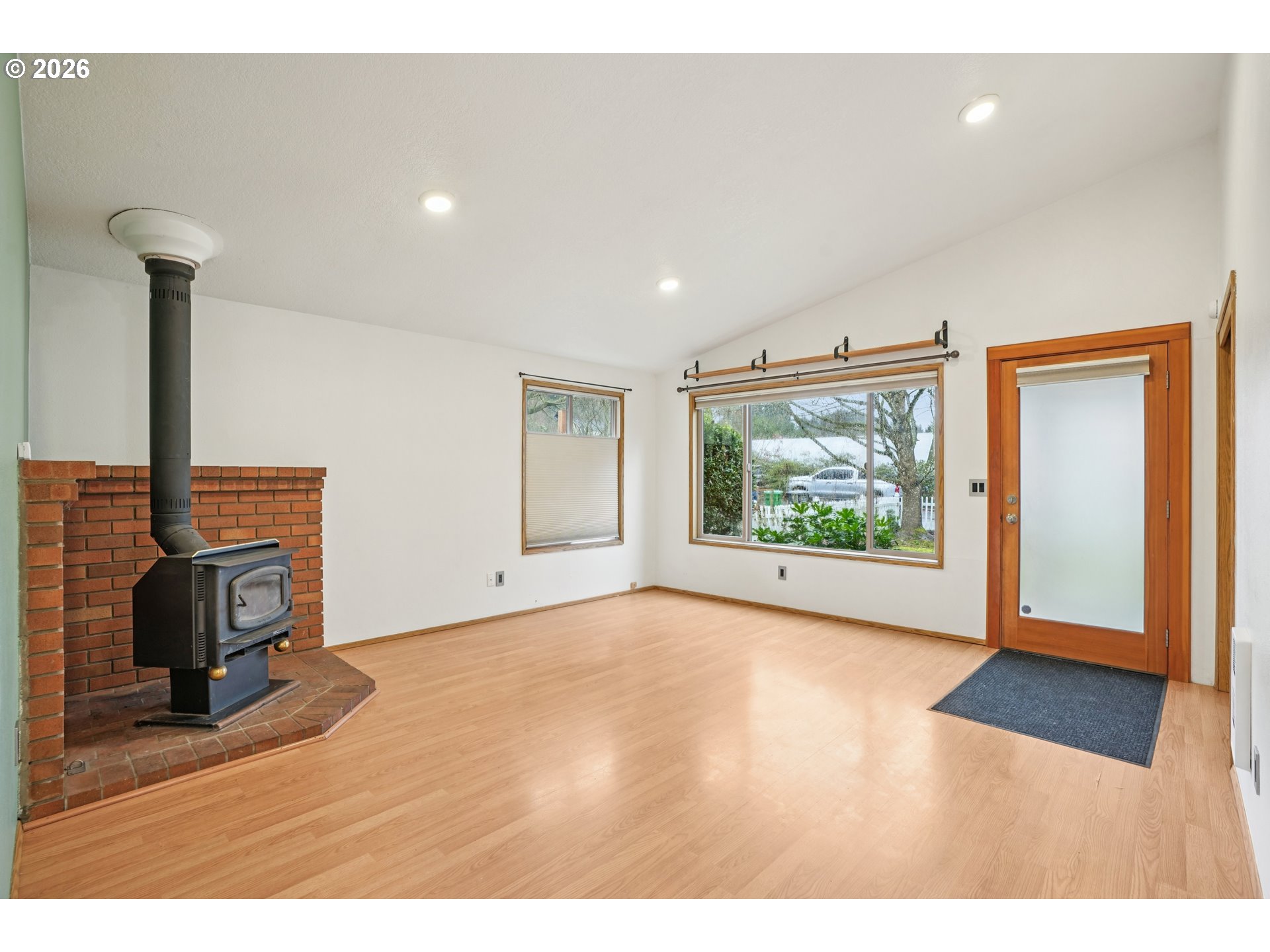 4133 Southeast Tibbetts Street Portland, OR 97202 - Photo 6 of 35 a view of empty room with fireplace and fan
