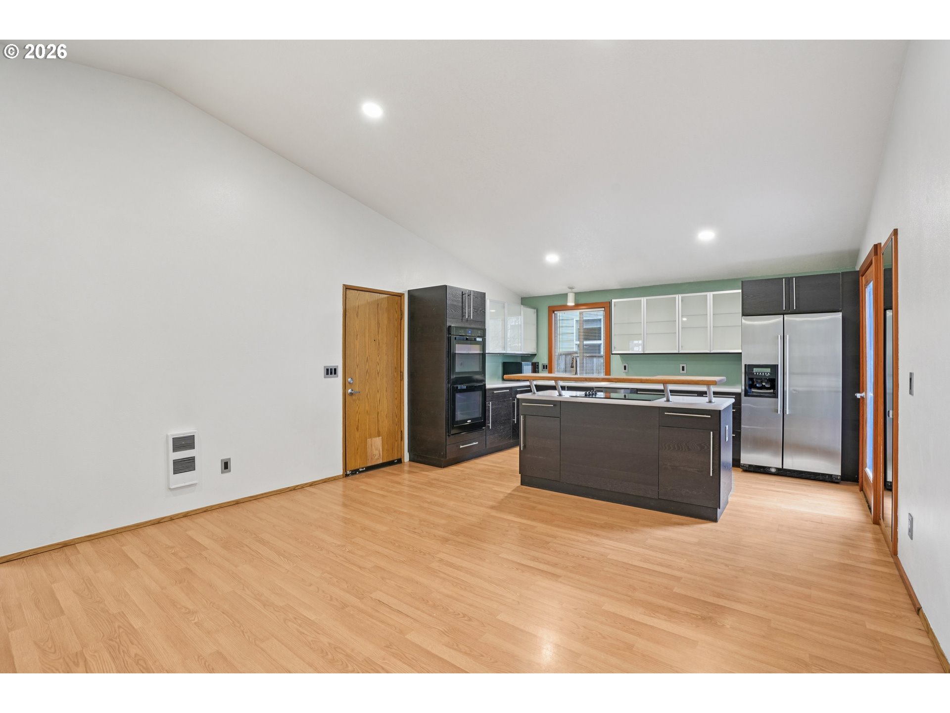 4133 Southeast Tibbetts Street Portland, OR 97202 - Photo 8 of 35 a large kitchen with stainless steel appliances granite countertop a refrigerator and a sink
