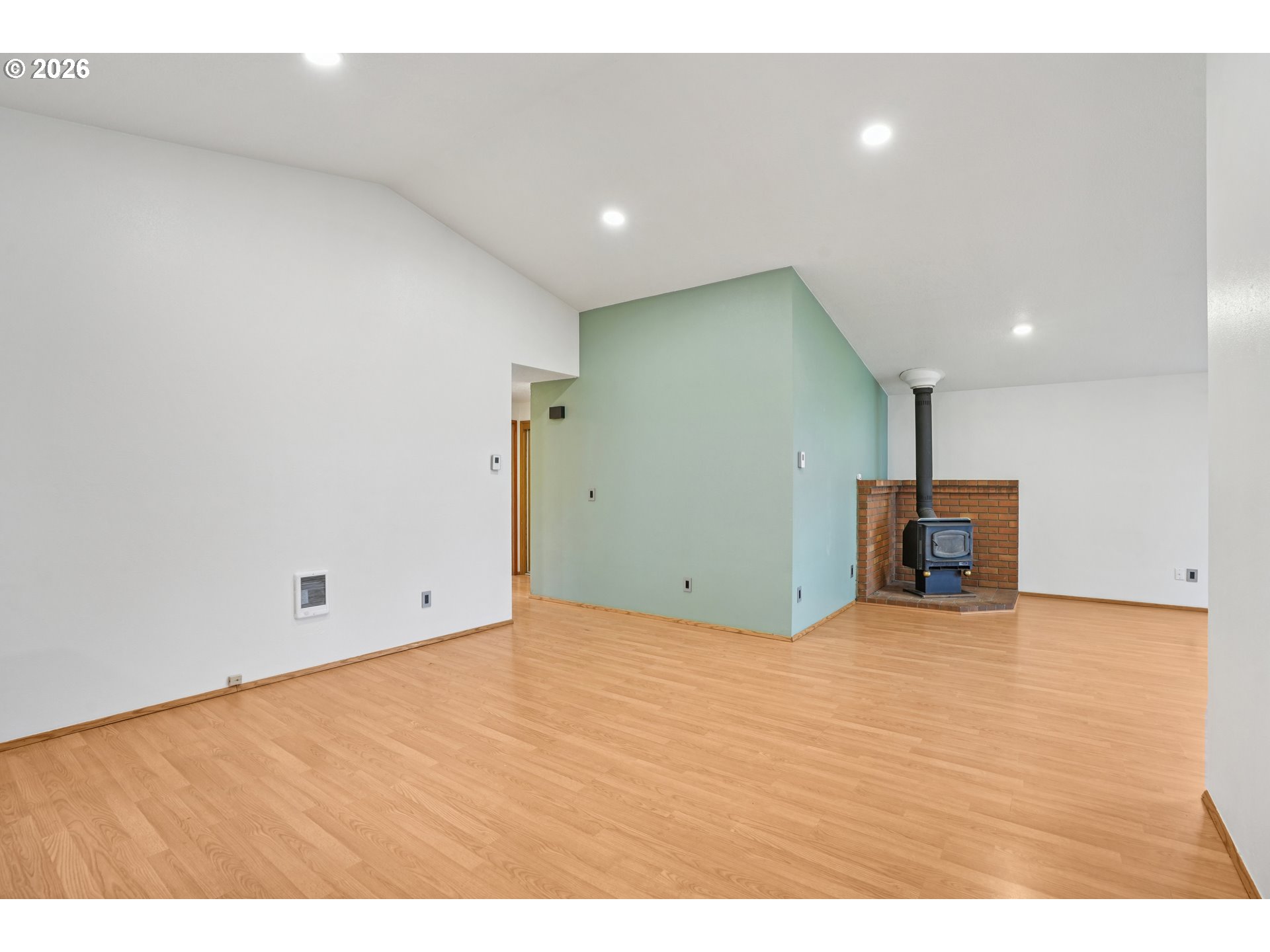 4133 Southeast Tibbetts Street Portland, OR 97202 - Photo 9 of 35 a view of an empty room with wooden floor
