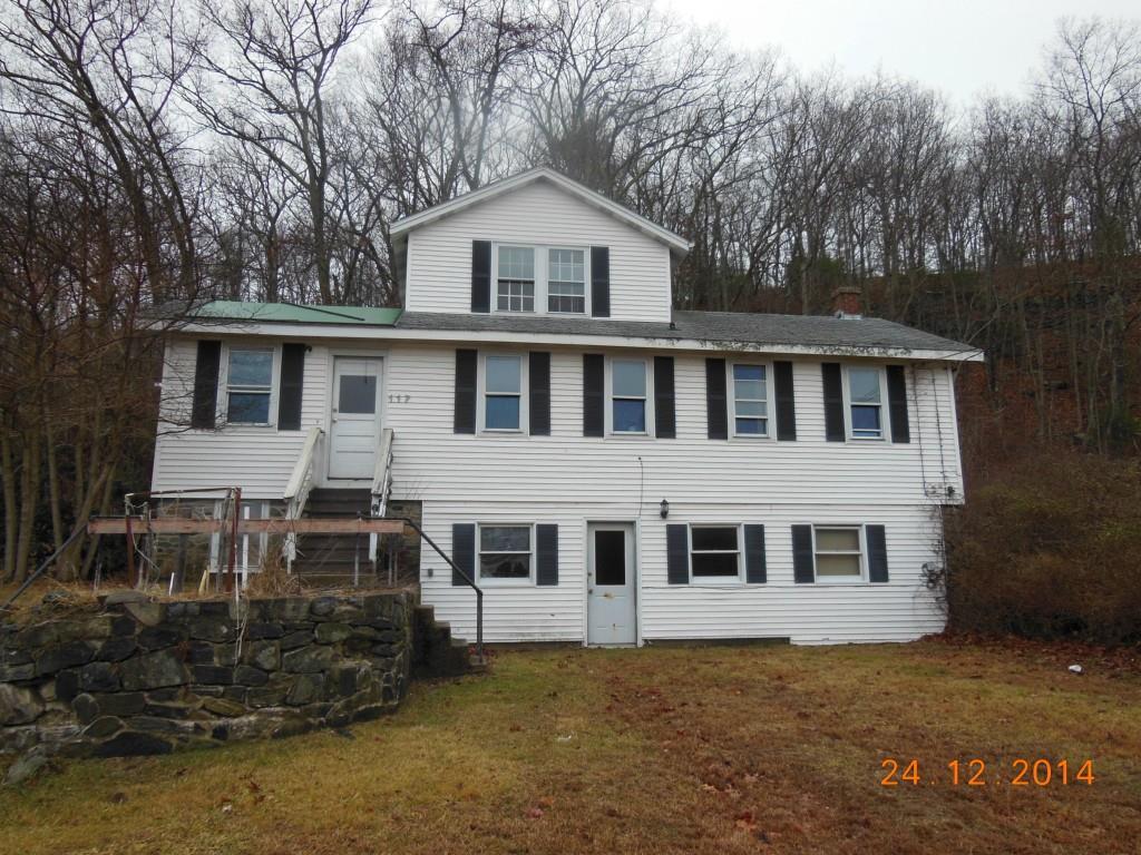 117 Norwich Road Plainfield, CT 06374 - Photo 1 of 1 a front view of a house with a yard