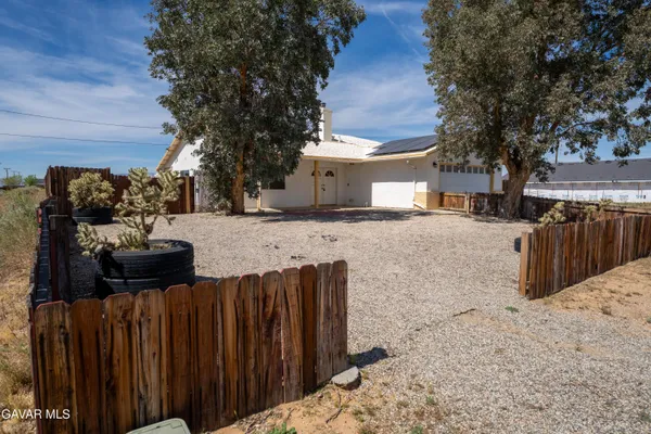 a street view with wooden fence