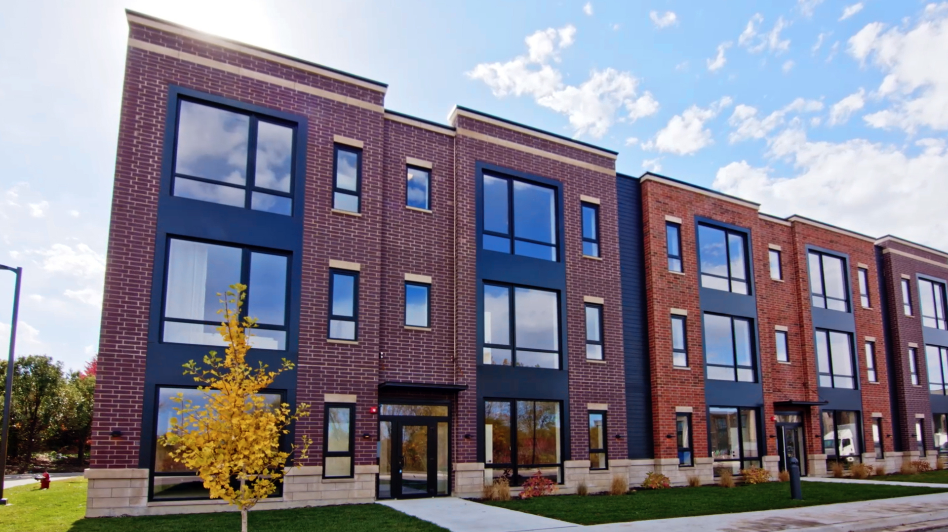 280 Stonington Drive, Unit 304 Bloomingdale, IL 60108 - Photo 1 of 21 a front view of multi story residential apartment building
