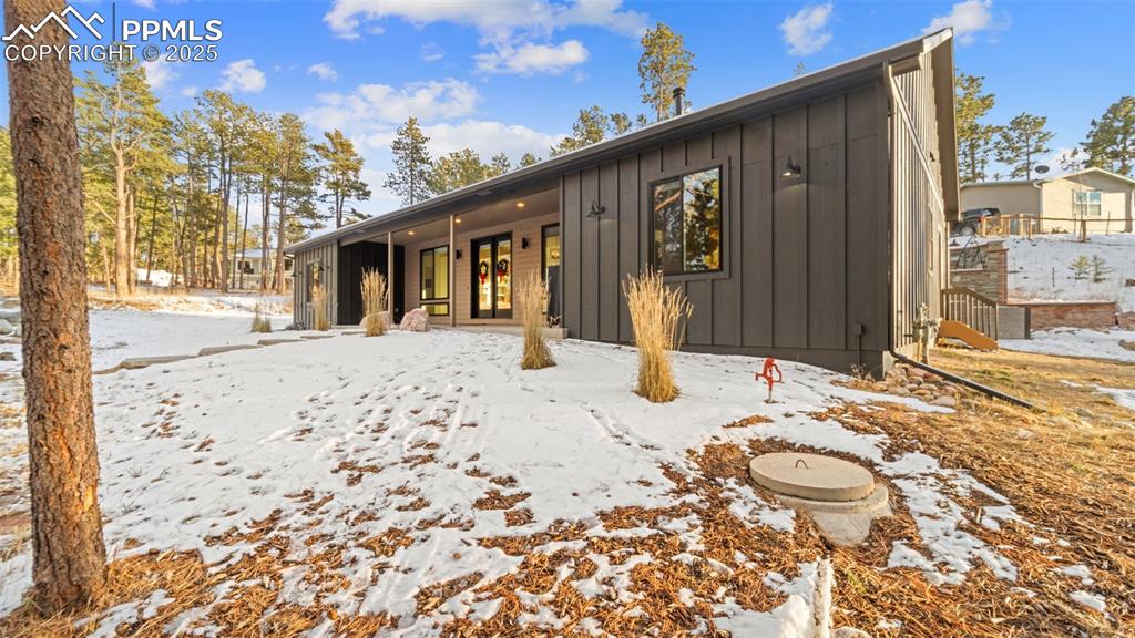 13455 Ravine Drive West Colorado Springs, CO 80908 - Photo 21 of 32 a front view of a house