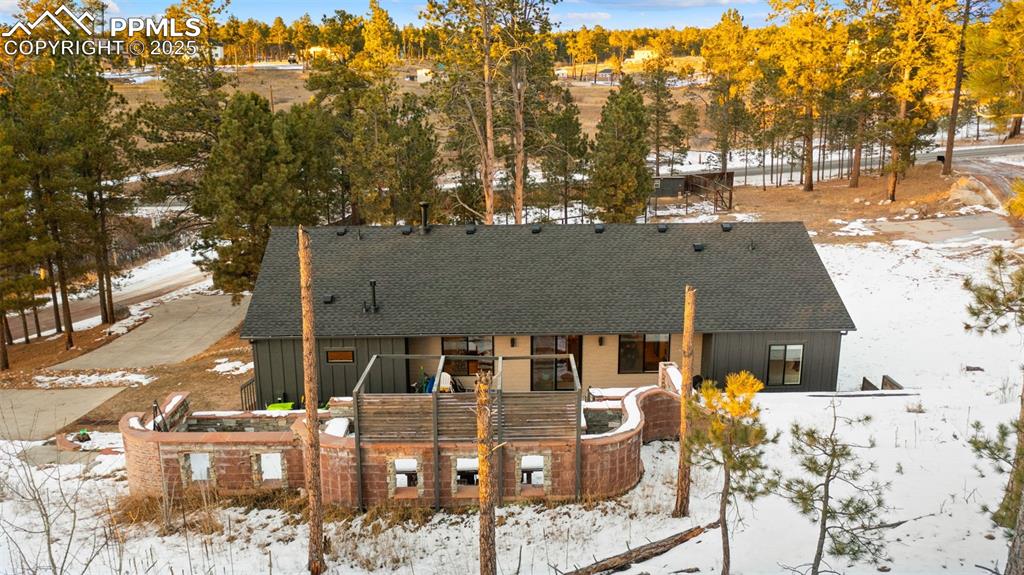 13455 Ravine Drive West Colorado Springs, CO 80908 - Photo 25 of 32 front view of house with a street