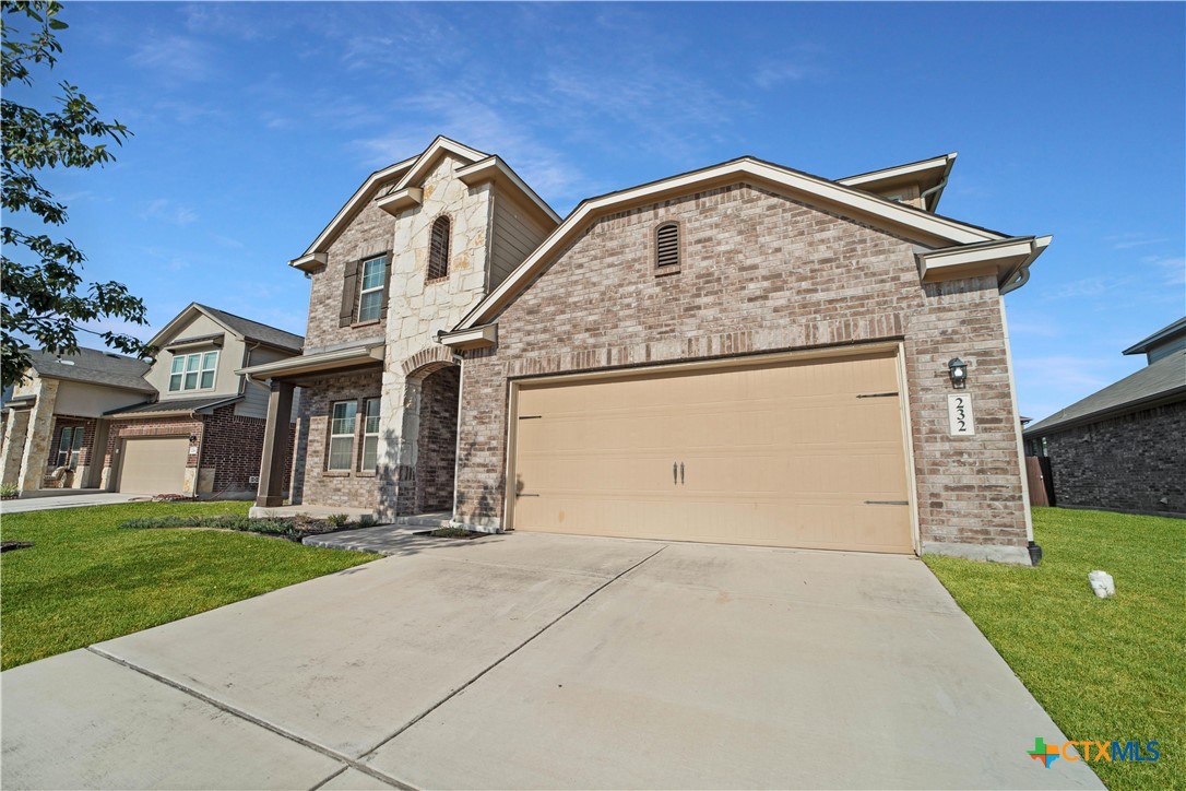 232 Albarella Cibolo, TX 78108 - Photo 1 of 42 a front view of a house with a yard