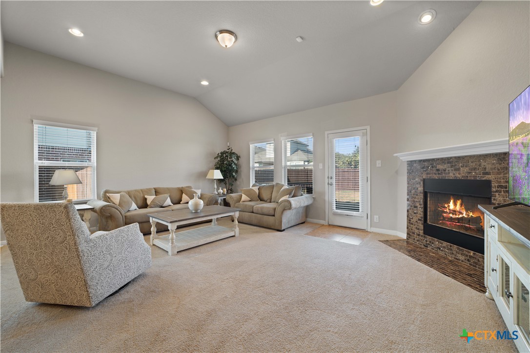 232 Albarella Cibolo, TX 78108 - Photo 19 of 42 a living room with furniture and a fireplace