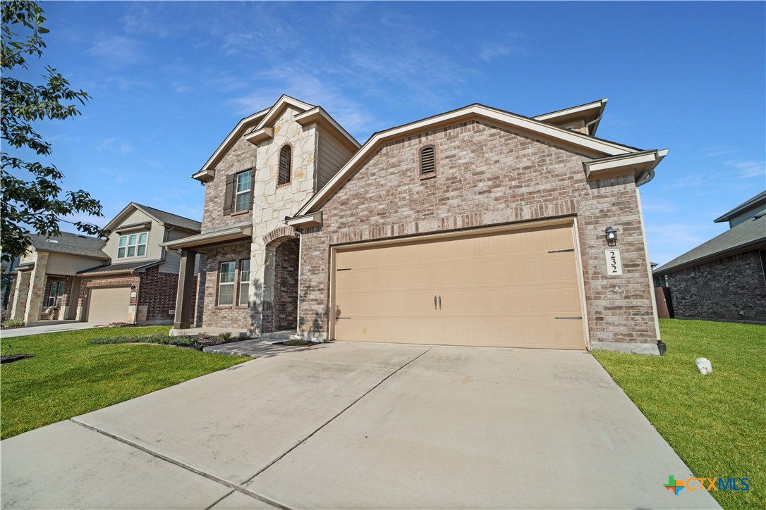232 Albarella Cibolo, TX 78108 - Photo 2 of 42 a front view of a house with a yard