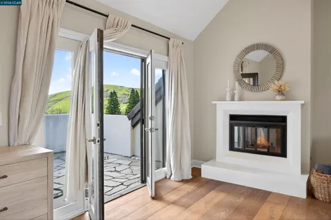 a bedroom with two beds and a couch