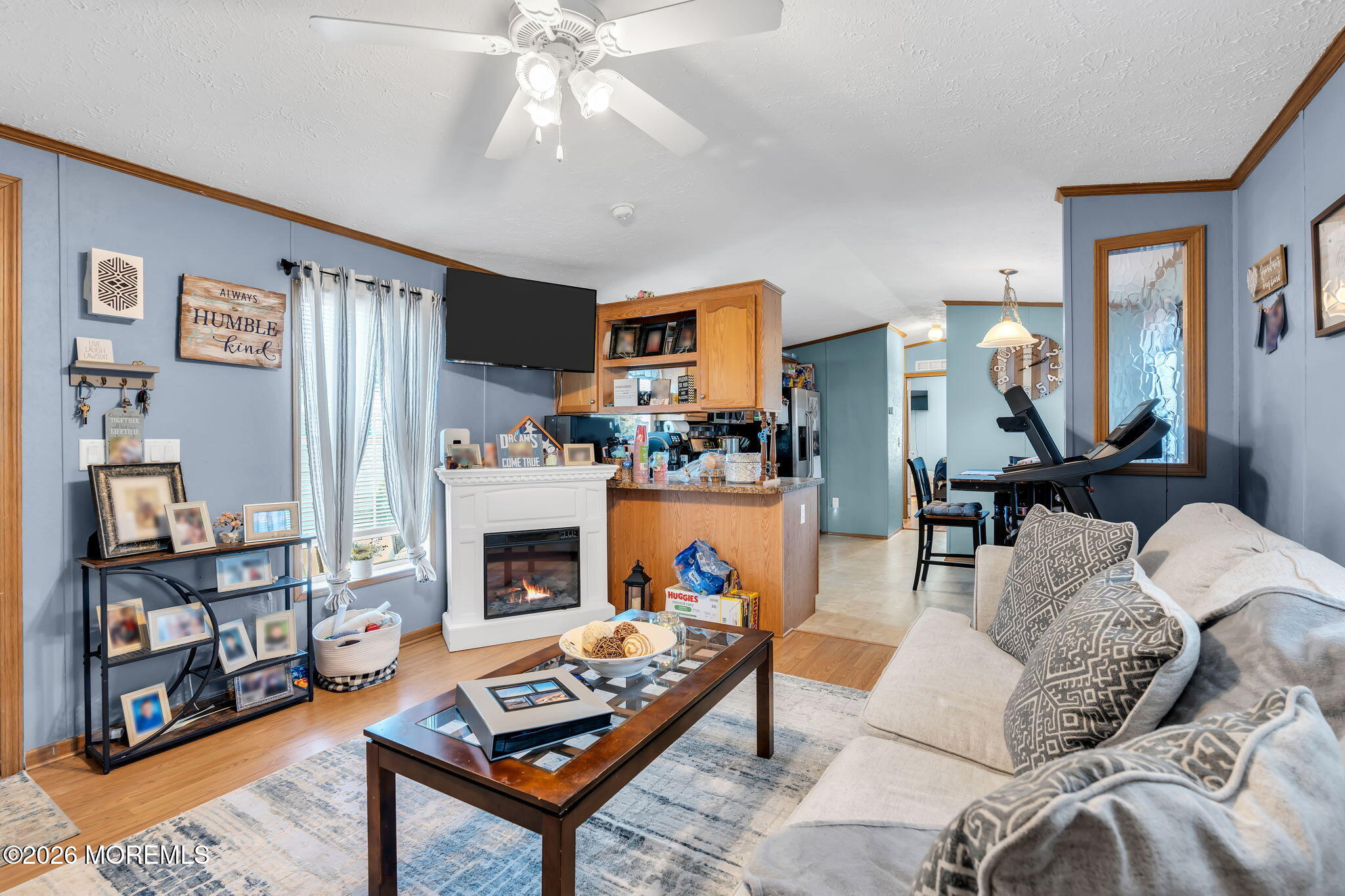 12 Locust Grove Hazlet, NJ 07730 - Photo 6 of 14 a living room with furniture and a fireplace